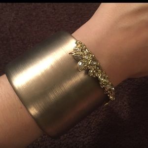 Alexis Bittar cuff bracelet in mocha color lucite & crystals in gold tone frame.